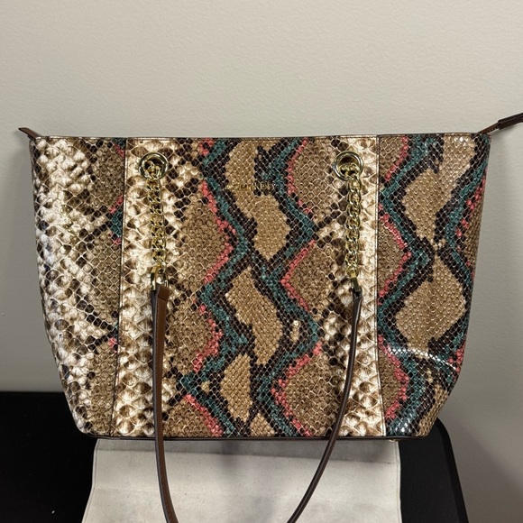 Calvin Klein Hayden Snake Tote
NWOT - Picture 2 of 13